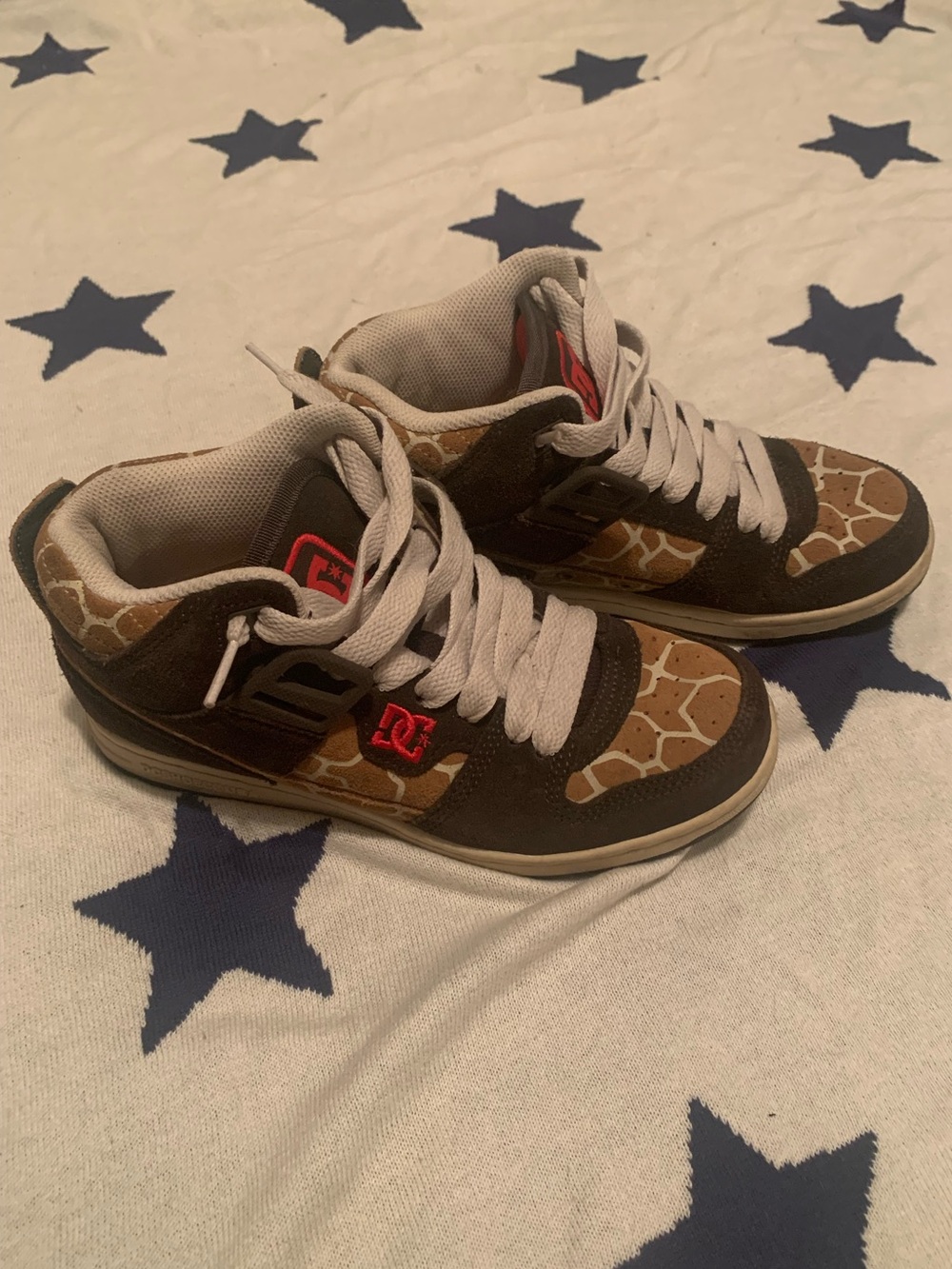 DC womens giraffe print sneakers with Red Logo